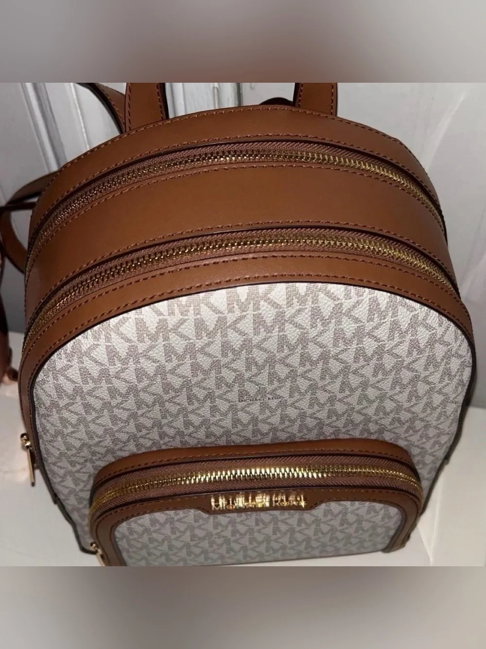 Michael Kors Ivory Monogram Backpack with Brown Trim
